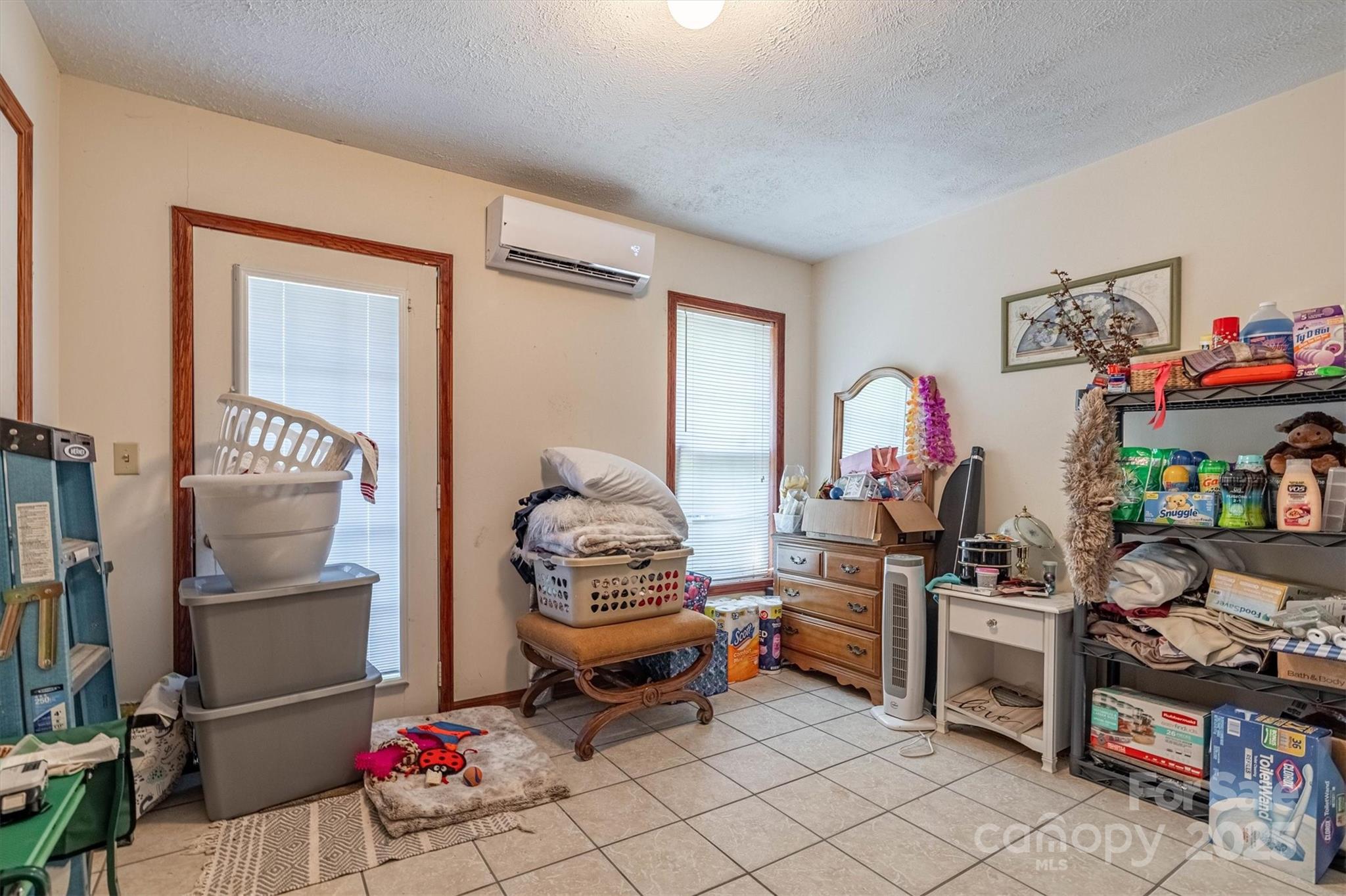 5933 Nubbin Creek Road Lenoir, NC 28645 - Photo 27 of 36 a living room with furniture a flat screen tv and a window