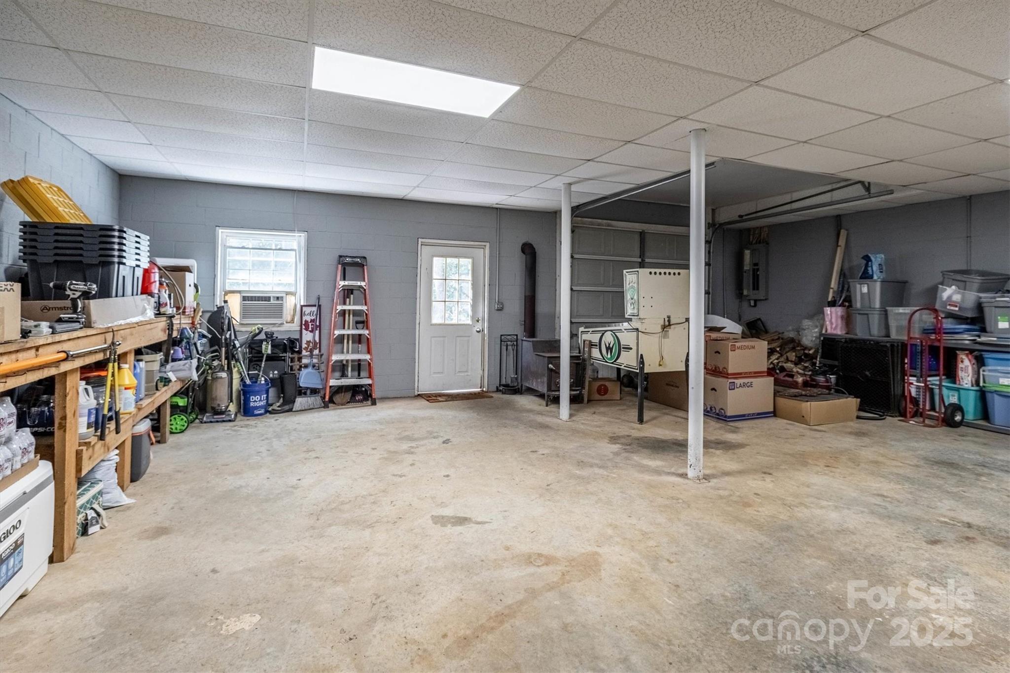 5933 Nubbin Creek Road Lenoir, NC 28645 - Photo 34 of 36 an empty room with furniture and a ceiling fan
