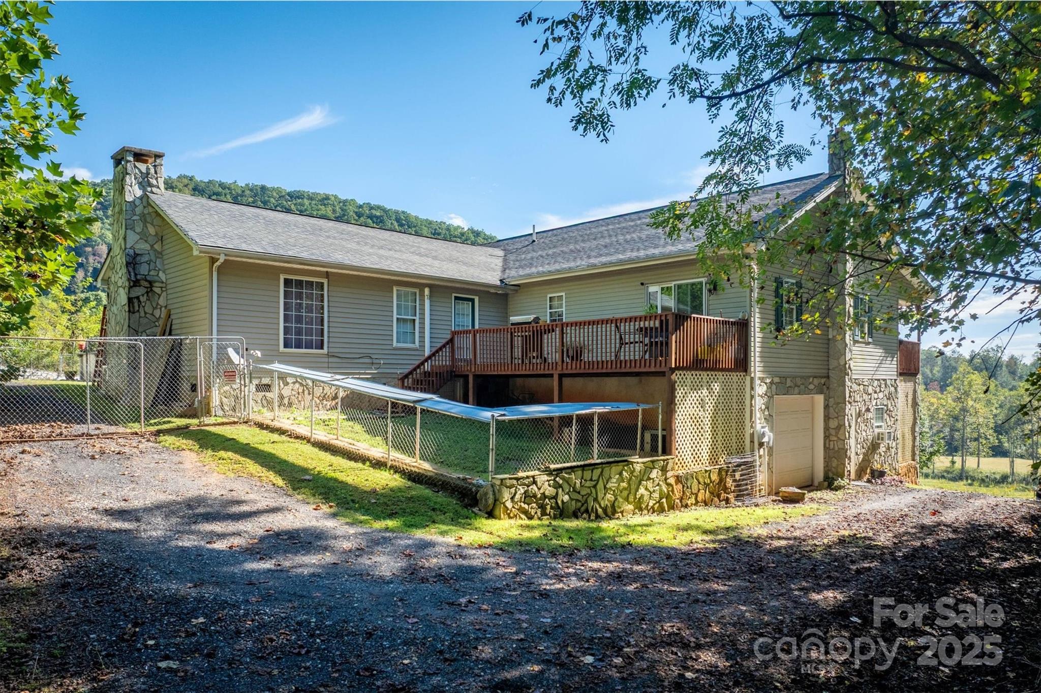 5933 Nubbin Creek Road Lenoir, NC 28645 - Photo 7 of 36 a view of a house with a yard