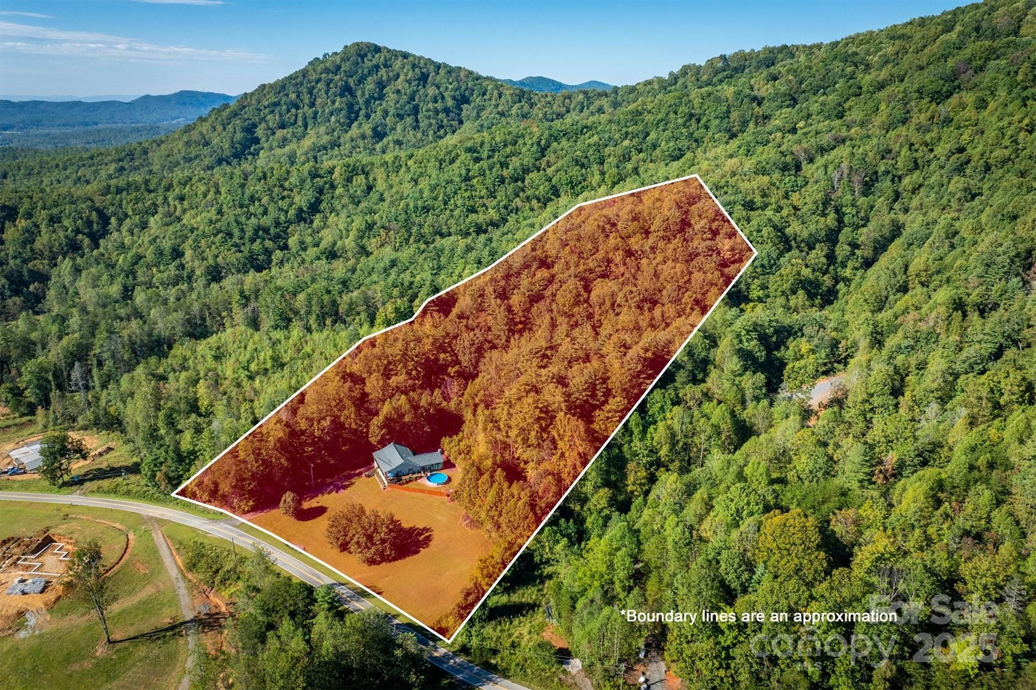 5933 Nubbin Creek Road Lenoir, NC 28645 - Photo 9 of 36 a view of a lush green forest