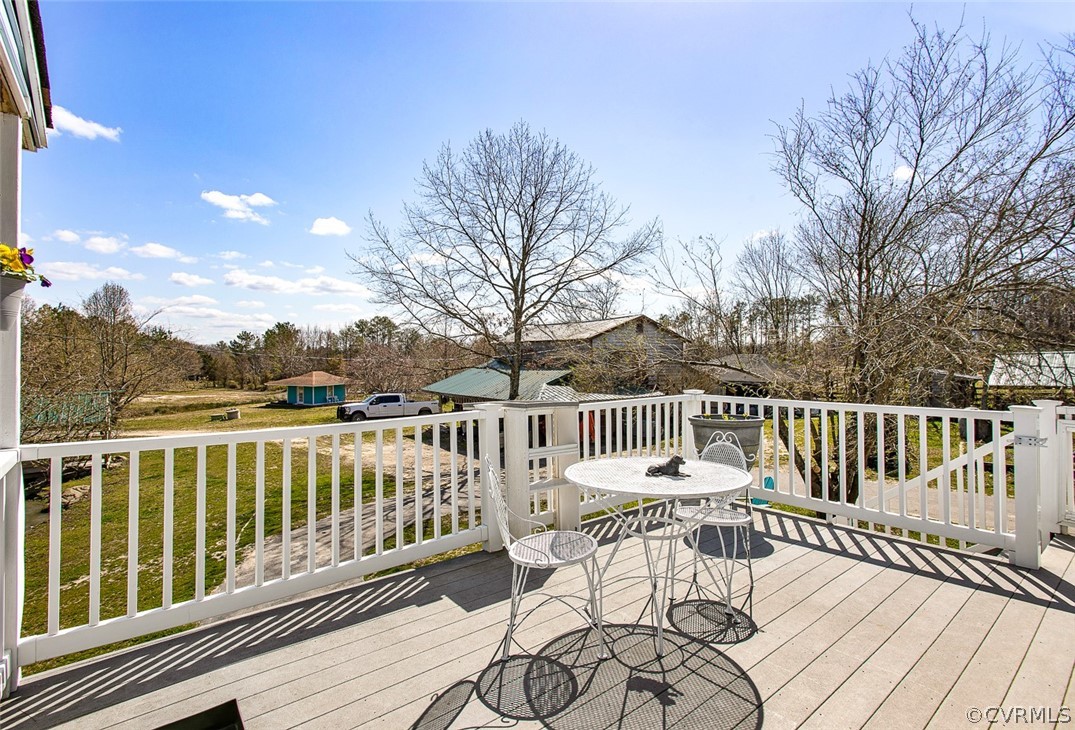 5011 Treely Road Chester, VA 23831 - Photo 36 of 50 a view of a chair and table on the terrace
