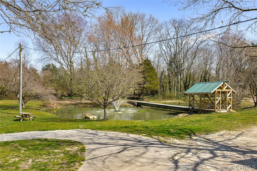 5011 Treely Road Chester, VA 23831 - Photo 37 of 50 a view of a house with a yard and swimming pool
