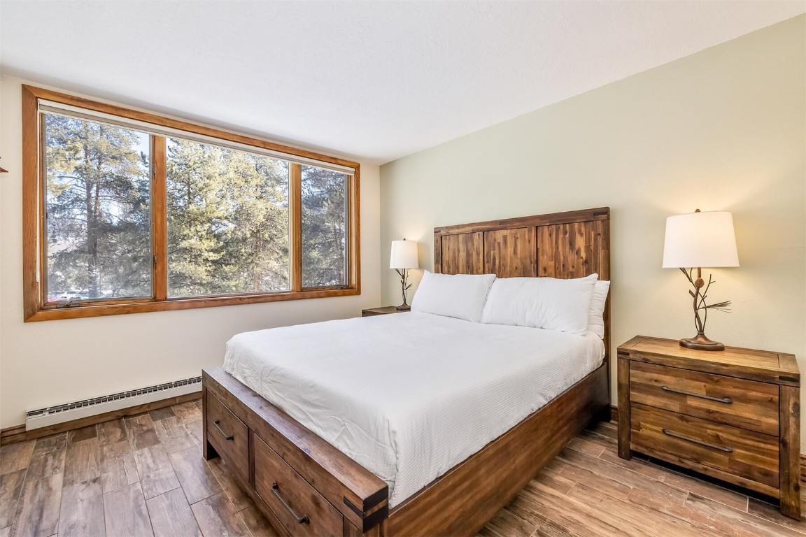 21630 Highway 6, Unit 2149 Keystone, CO 80435 - Photo 19 of 35 a bedroom with a bed and a window