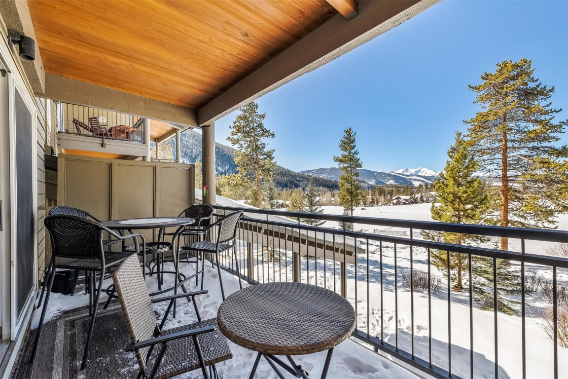 21630 Highway 6, Unit 2149 Keystone, CO 80435 - Photo 23 of 35 a view of a chairs and table in patio
