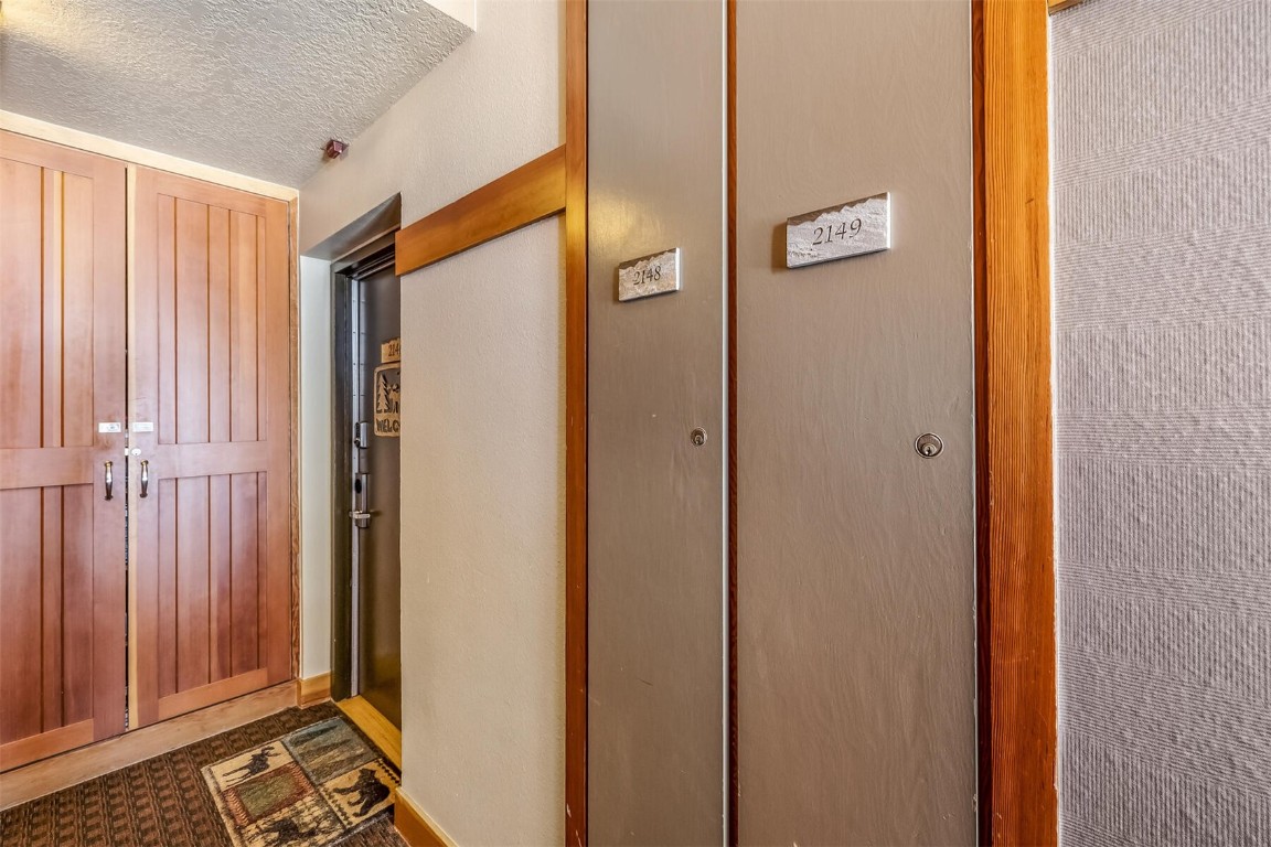 21630 Highway 6, Unit 2149 Keystone, CO 80435 - Photo 25 of 35 a bathroom with a mirror and a shower