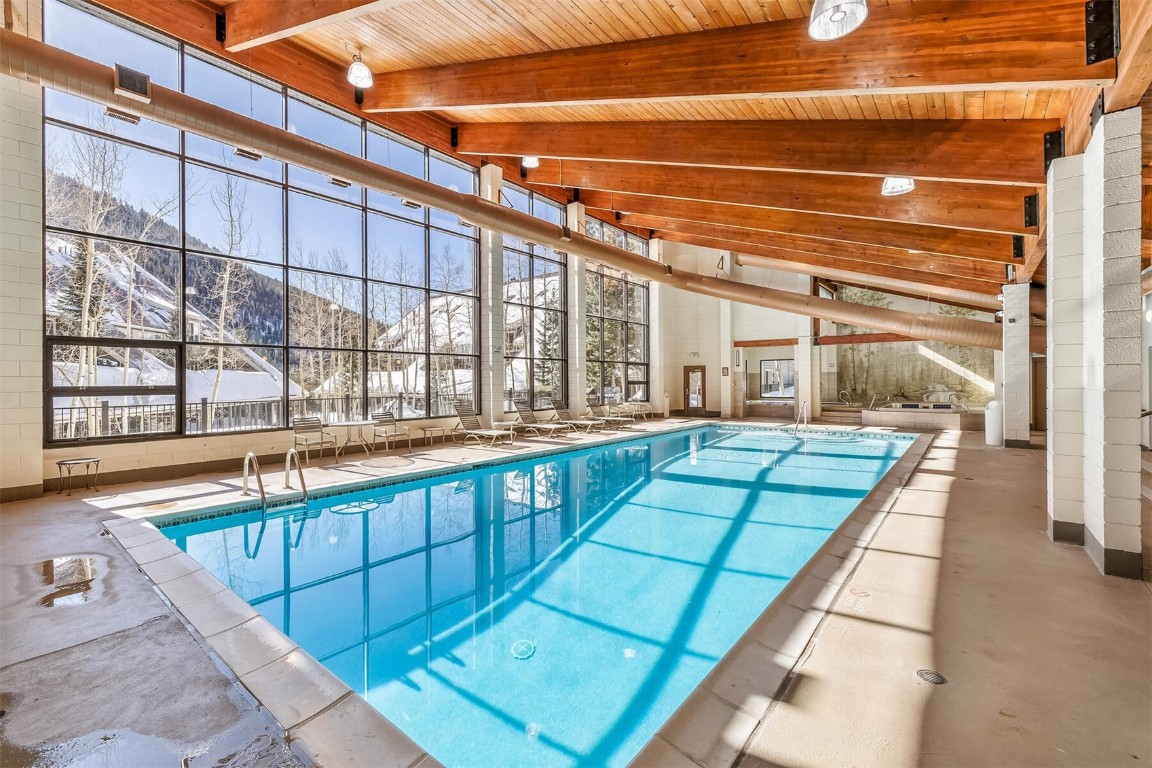 21630 Highway 6, Unit 2149 Keystone, CO 80435 - Photo 26 of 35 a view of swimming pool with a lounge chair