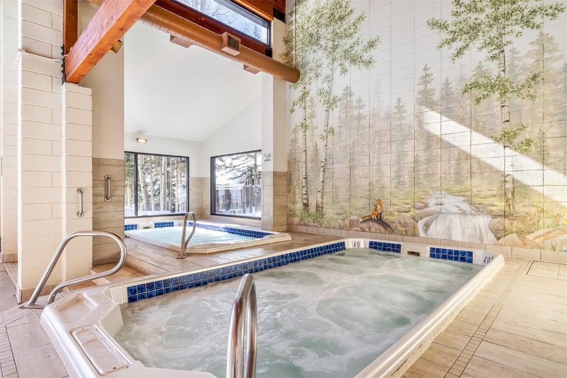 21630 Highway 6, Unit 2149 Keystone, CO 80435 - Photo 28 of 35 a view of a swimming pool with a patio