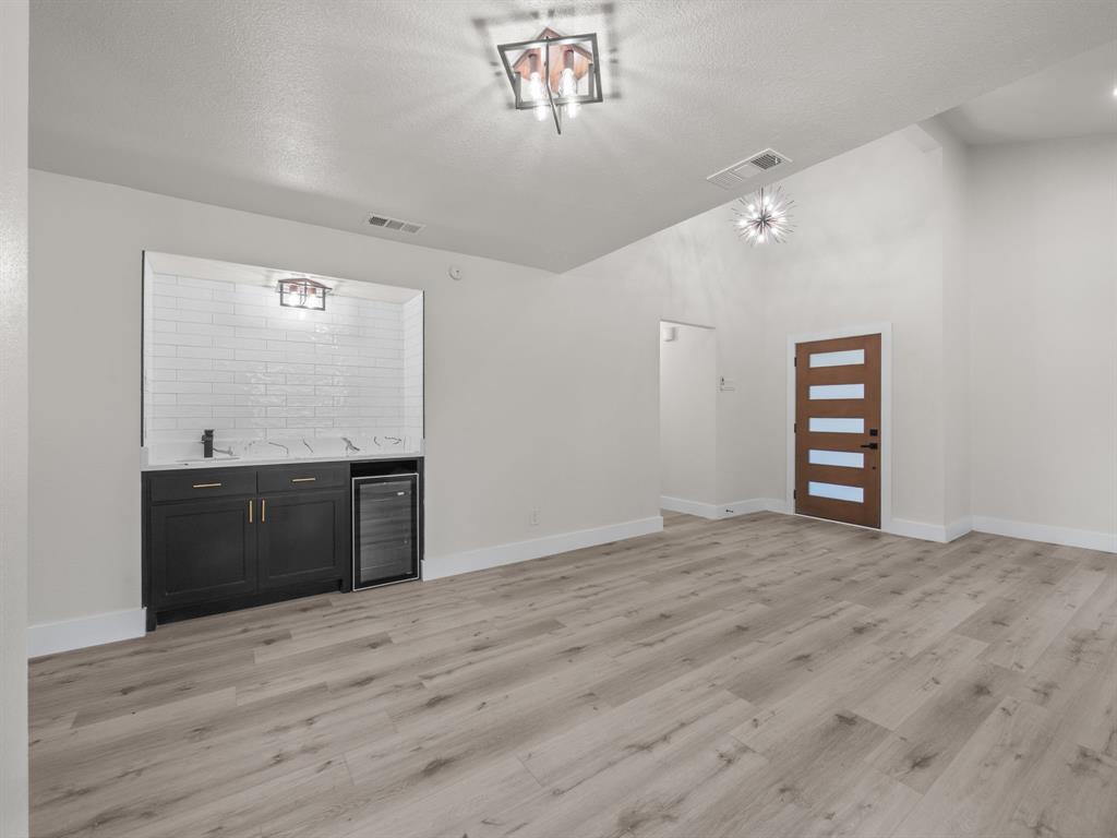 2127 Wheaton Drive Richardson, TX 75081 - Photo 15 of 33 a view of an empty room with a window