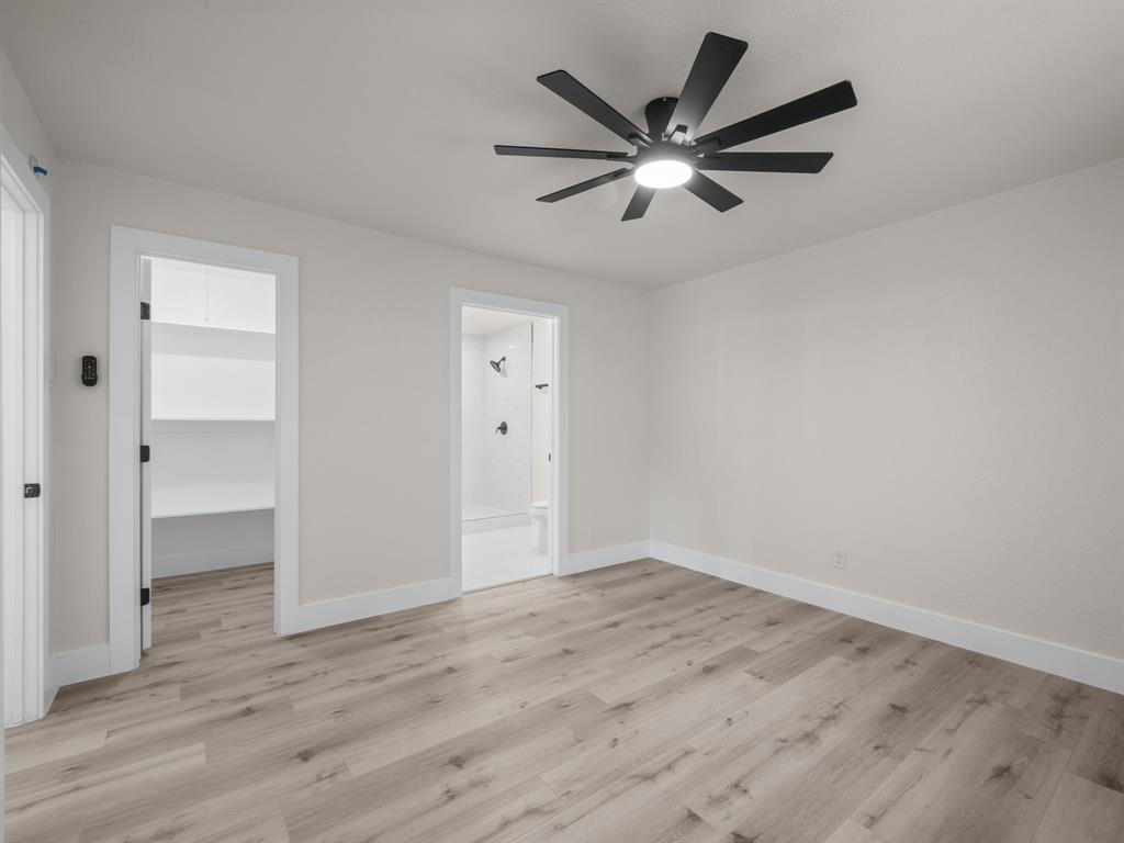 2127 Wheaton Drive Richardson, TX 75081 - Photo 22 of 33 wooden floor in an empty room