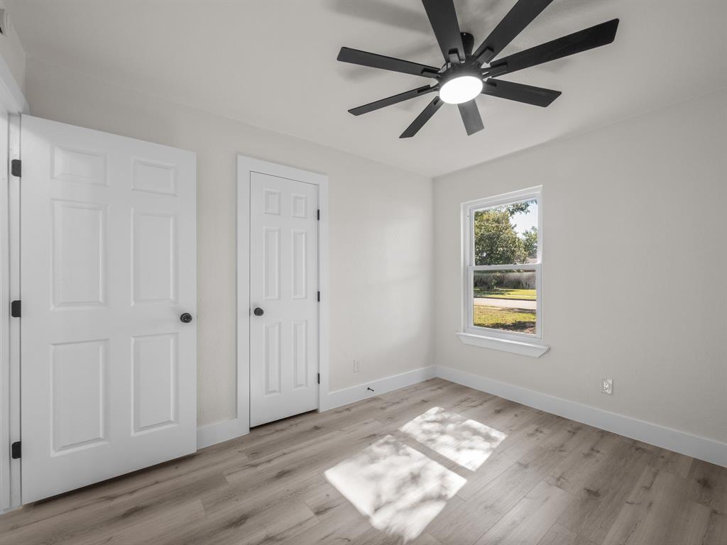 2127 Wheaton Drive Richardson, TX 75081 - Photo 27 of 33 a view of an empty room and window
