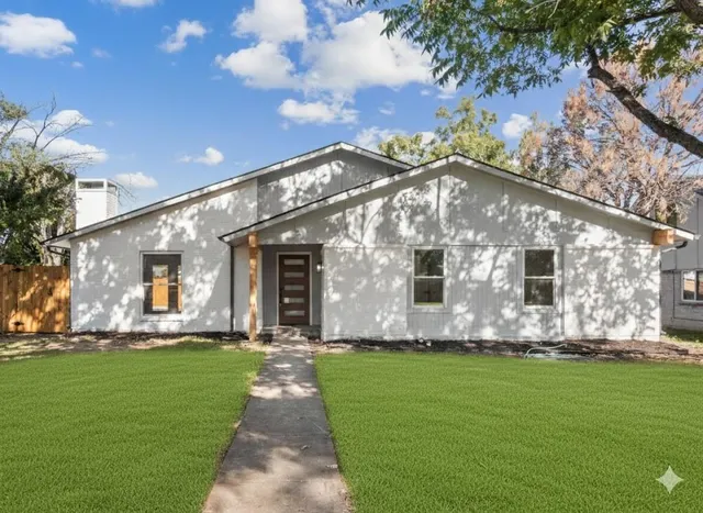 a front view of house with yard