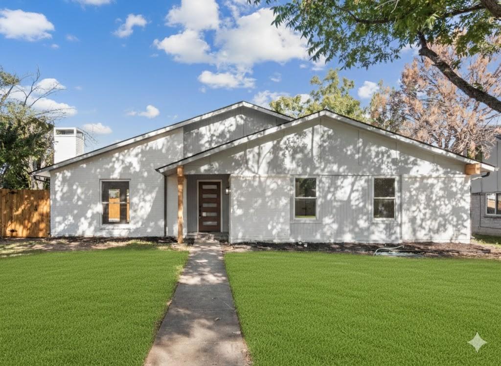 2127 Wheaton Drive Richardson, TX 75081 - Photo 3 of 33 a front view of house with yard