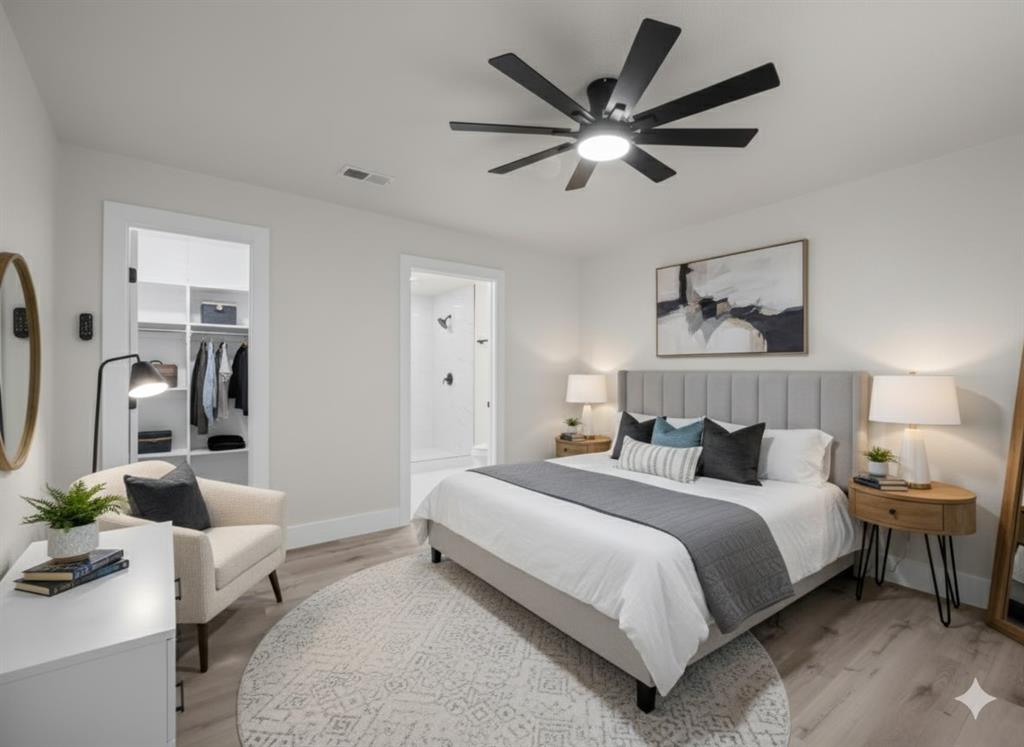 2127 Wheaton Drive Richardson, TX 75081 - Photo 5 of 33 a bedroom with a large bed and paintings on the wall