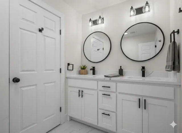 a bathroom with a double vanity sink and a mirror