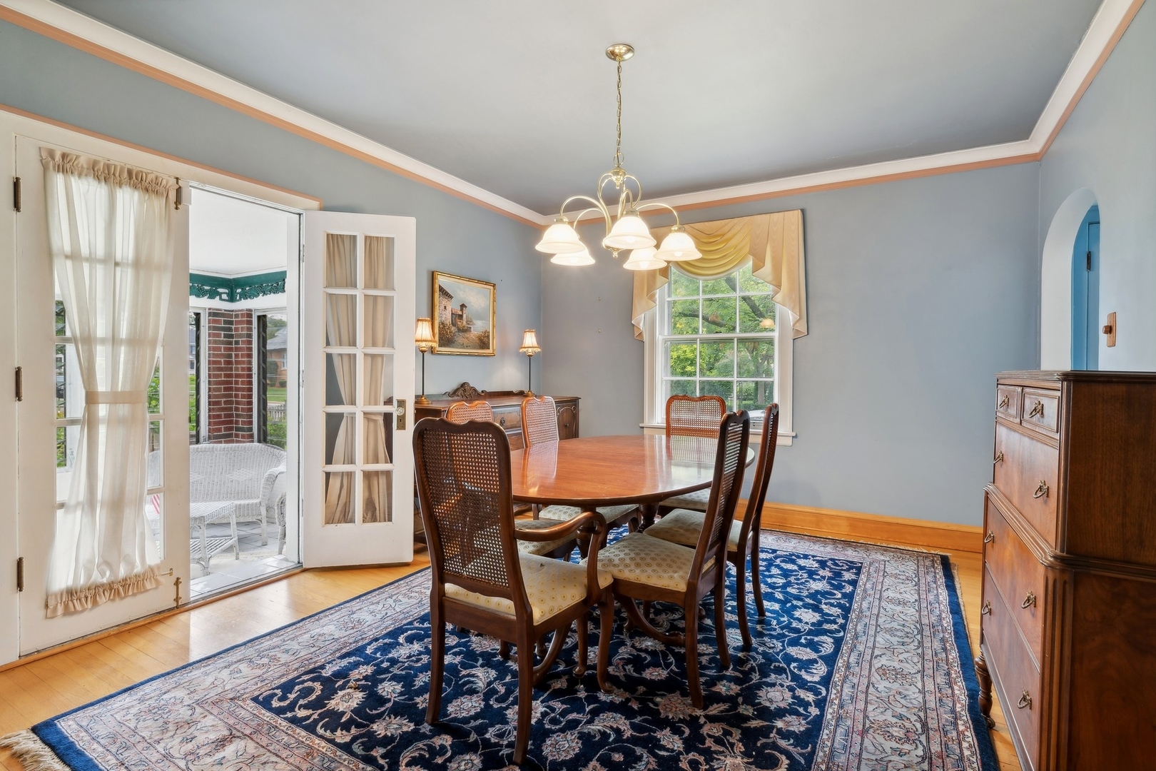 134 Wisner Street Park Ridge, IL 60068 - Photo 6 of 24 a dining room with furniture a chandelier and wooden floor