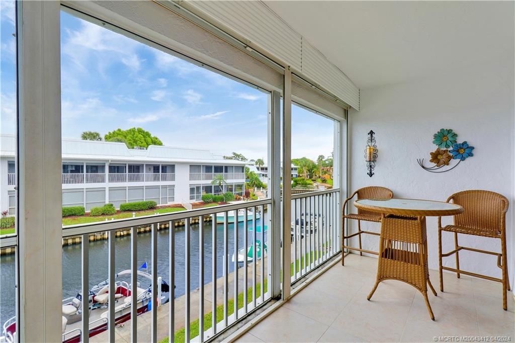 1864 Southwest Palm City Road, Unit 202 Stuart, FL 34994 - Photo 26 of 29 Looking toward clubhouse