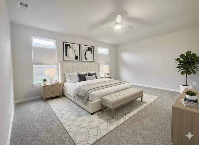 a bedroom with bed and window