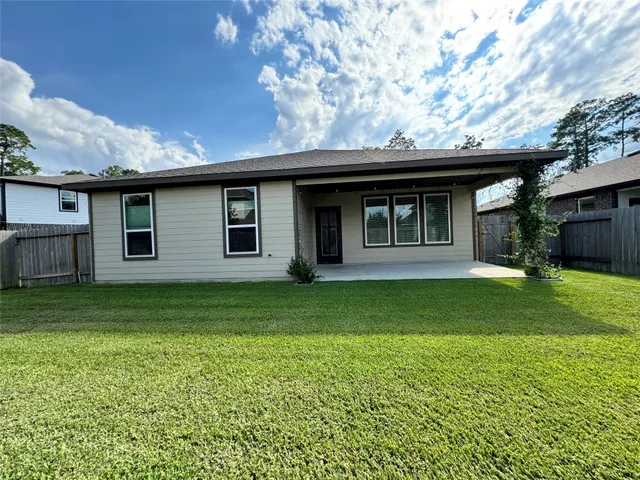 a house view with a garden space