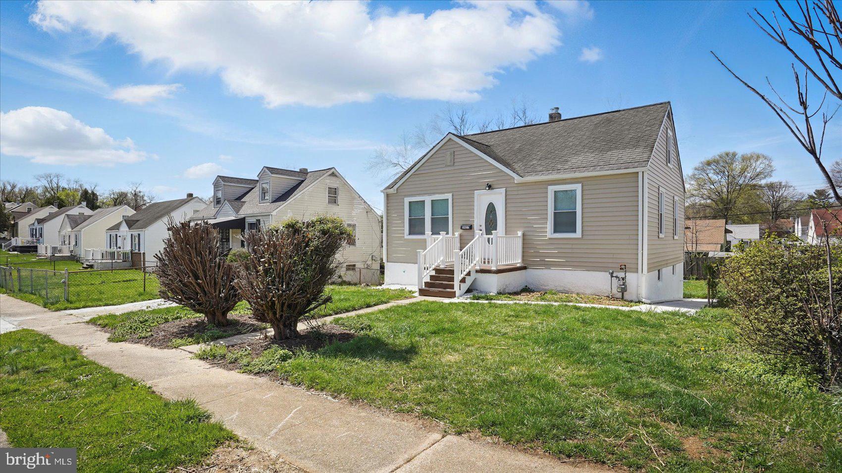 5427 Gradin Avenue Gwynn Oak, MD 21207 - Photo 21 of 24 a house view with a garden space
