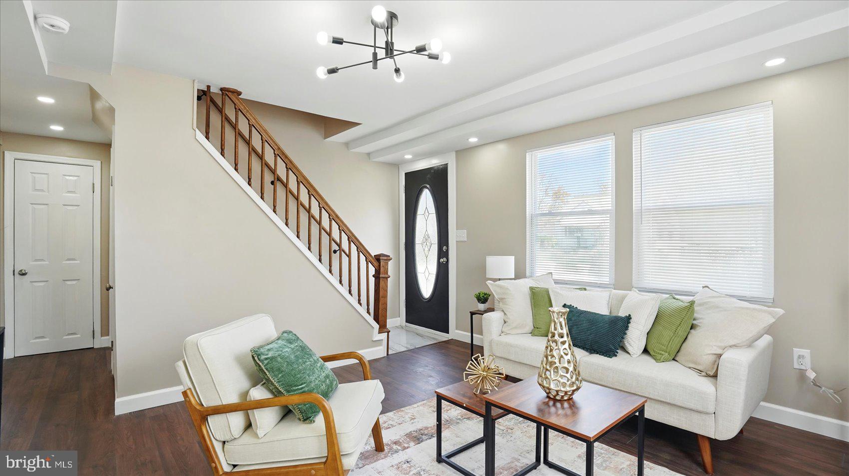 5427 Gradin Avenue Gwynn Oak, MD 21207 - Photo 6 of 24 a living room with furniture and wooden floor