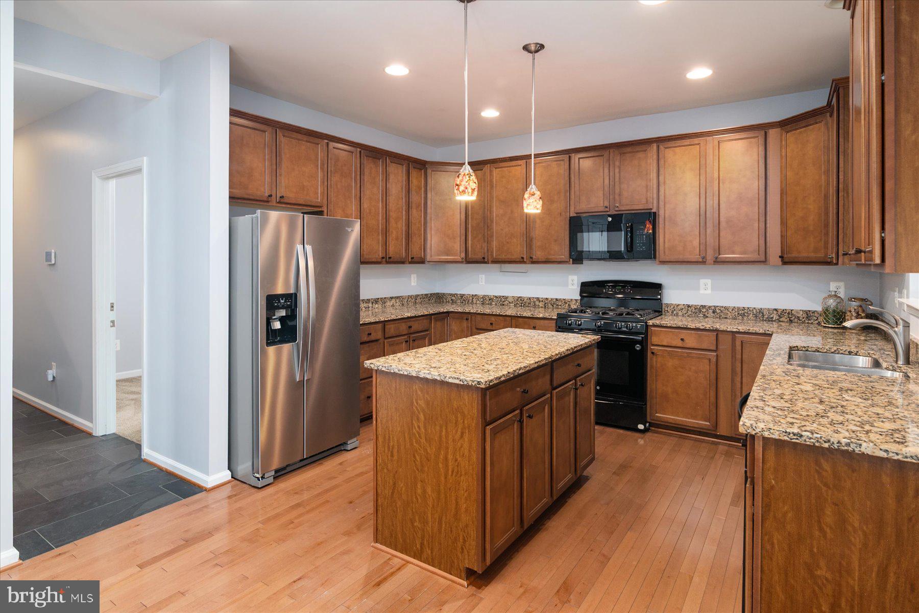 1411 Winter Pine Trail Severn, MD 21144 - Photo 17 of 53 Down the hall Office, Laundry and Bathroom