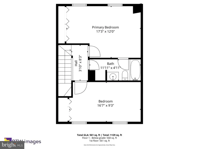 a picture of a bench in front of a wall