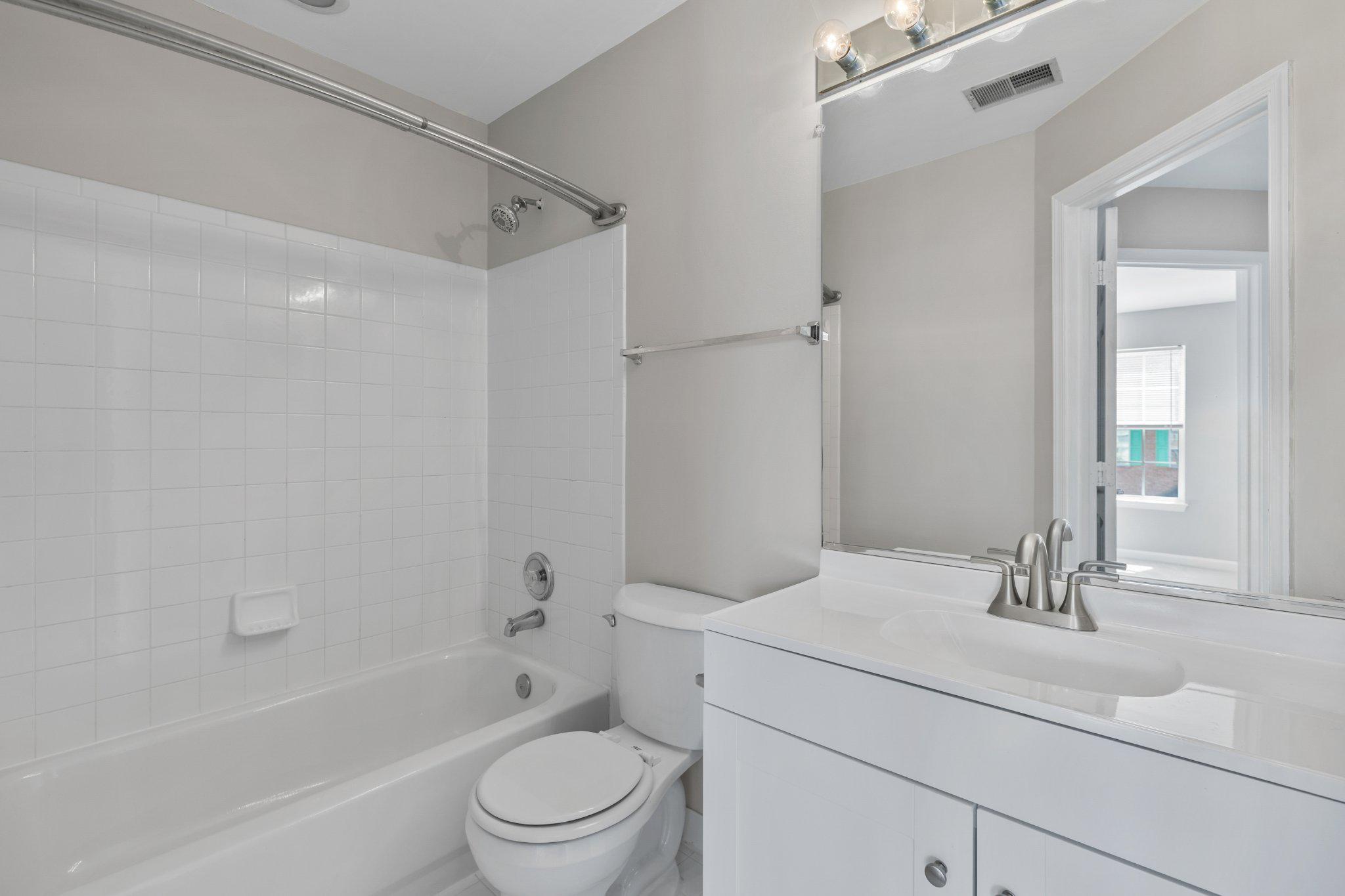 9241 Lorton Valley Road Lorton, VA 22079 - Photo 26 of 45 Bathroom2 with new vanity & white ceramic tiles.