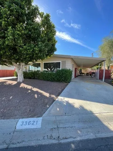 a view of a street with a building in the background