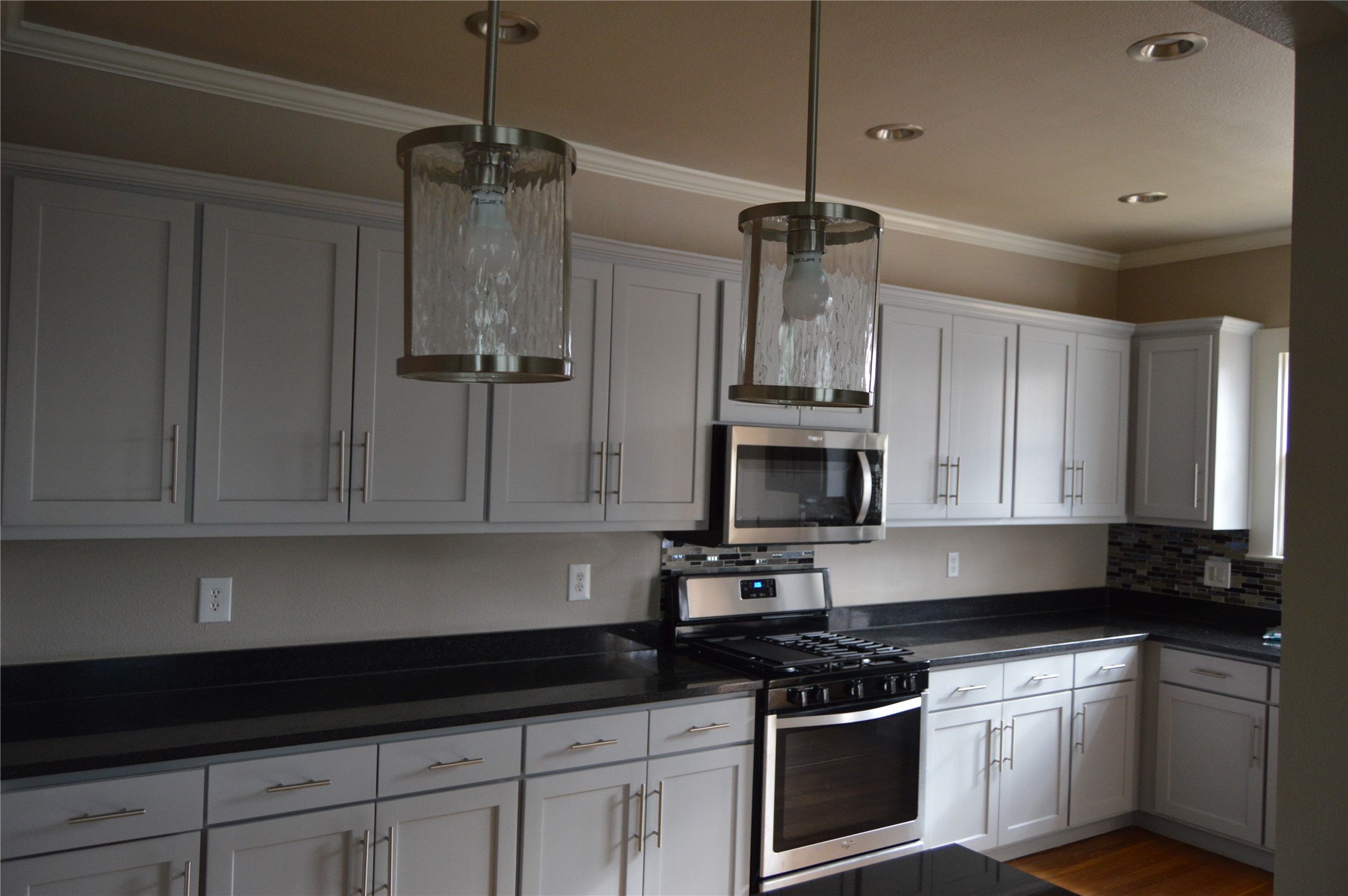 1709 Enfield Road, Unit A Austin, TX 78703 - Photo 6 of 8 Culinary delights await in this bright kitchen with modern stainless appliances and ample cabinet space.