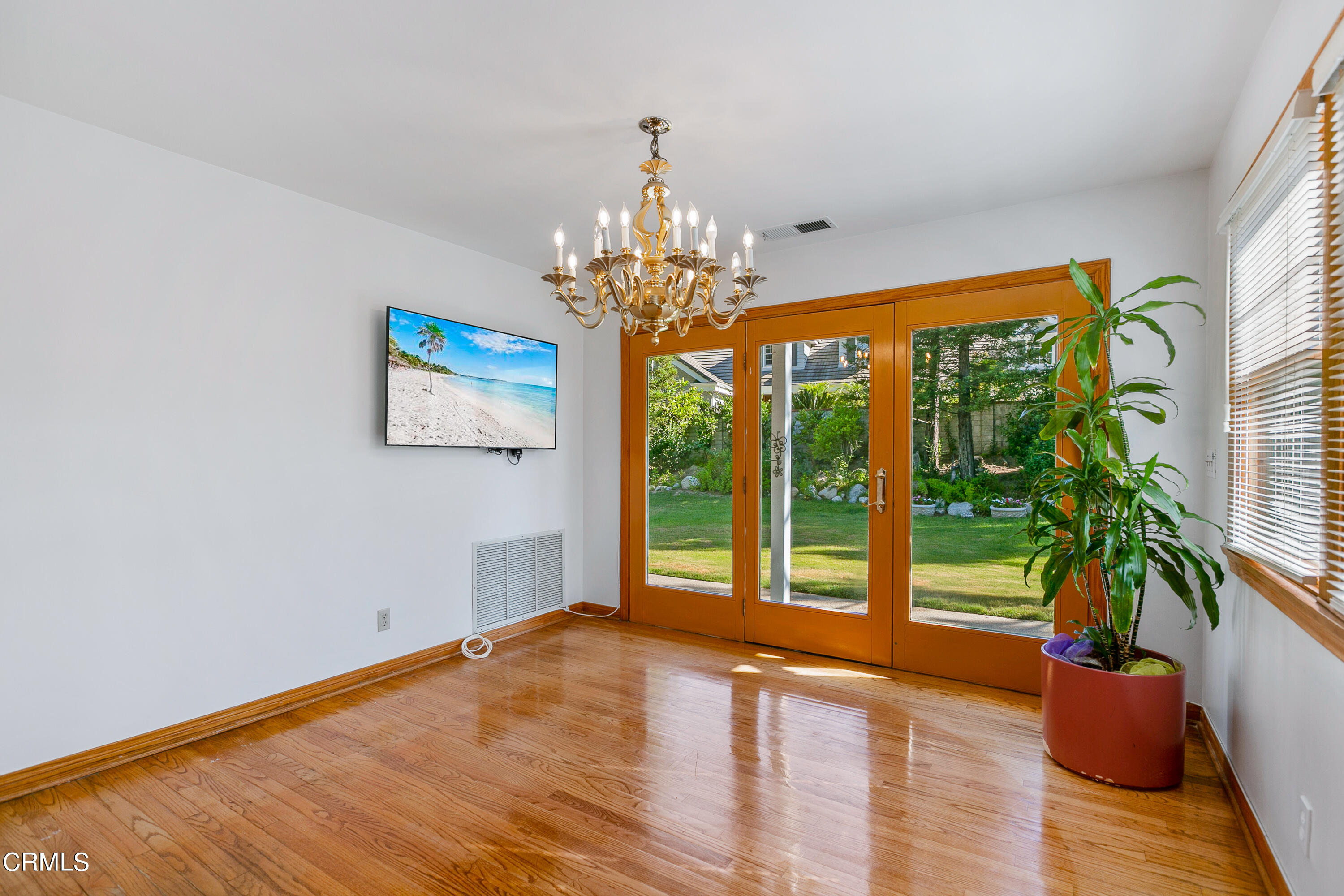 800 Greenridge Drive La Canada Flintridge, CA 91011 - Photo 16 of 58 a view of an empty room with wooden floor and a window