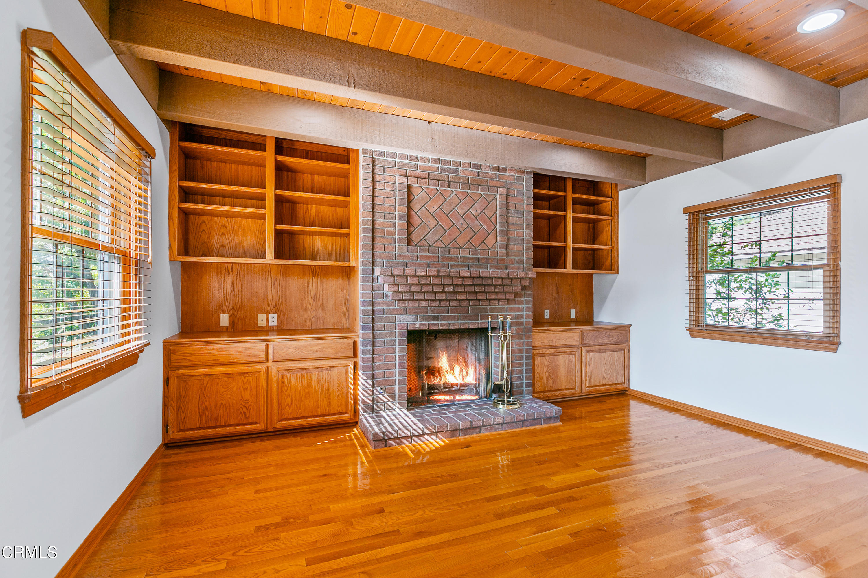 800 Greenridge Drive La Canada Flintridge, CA 91011 - Photo 19 of 58 a living room with stainless steel appliances kitchen island furniture and a fireplace