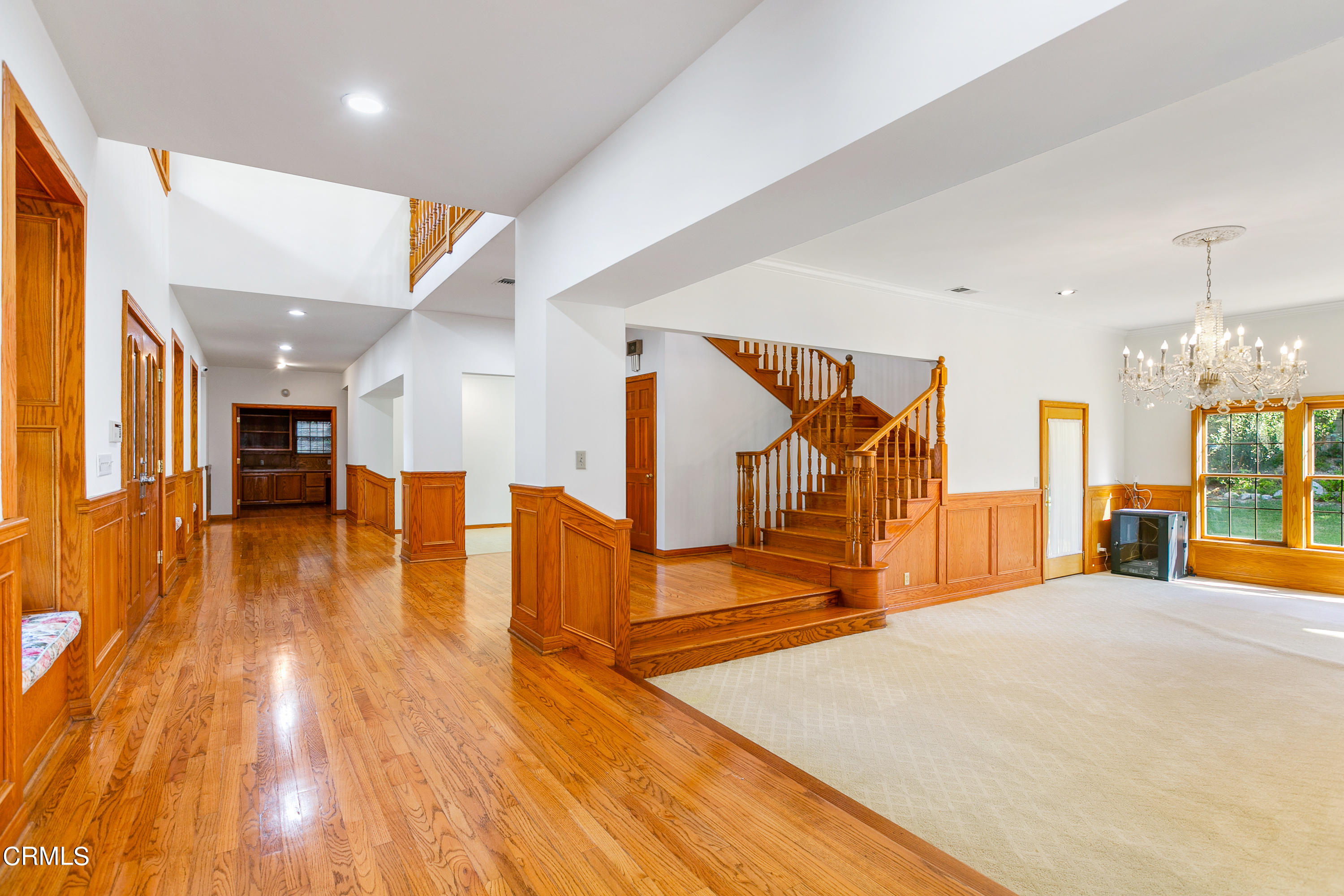 800 Greenridge Drive La Canada Flintridge, CA 91011 - Photo 21 of 58 a view of a hall with wooden floor
