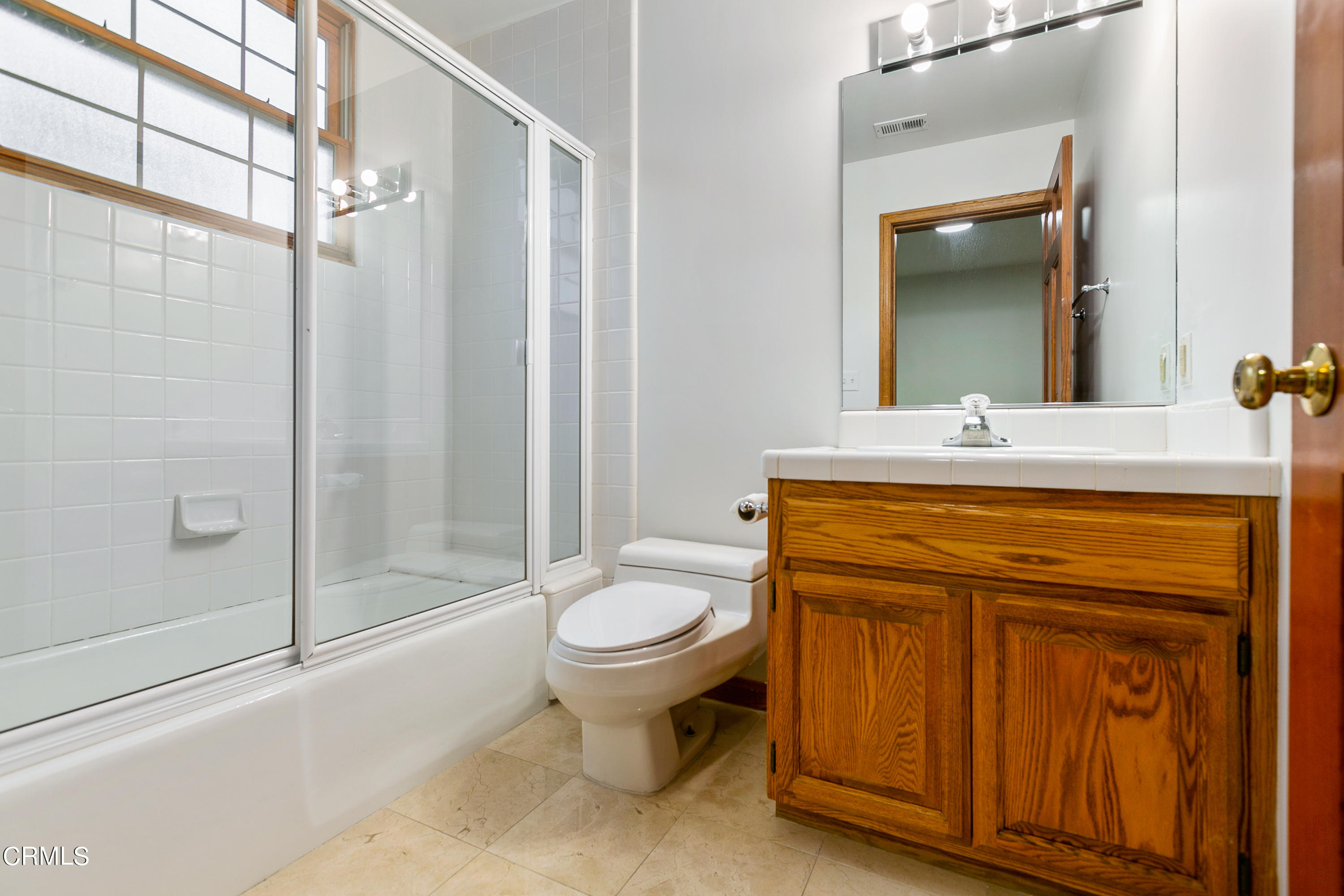 800 Greenridge Drive La Canada Flintridge, CA 91011 - Photo 28 of 58 a bathroom with a sink toilet and shower