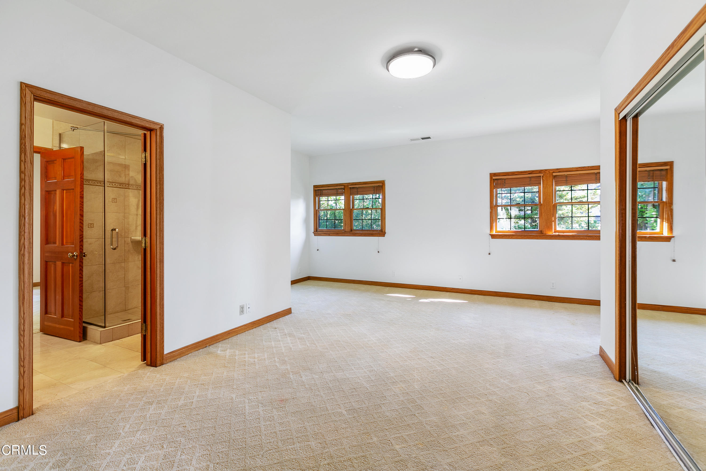 800 Greenridge Drive La Canada Flintridge, CA 91011 - Photo 42 of 58 an empty room with windows and closet