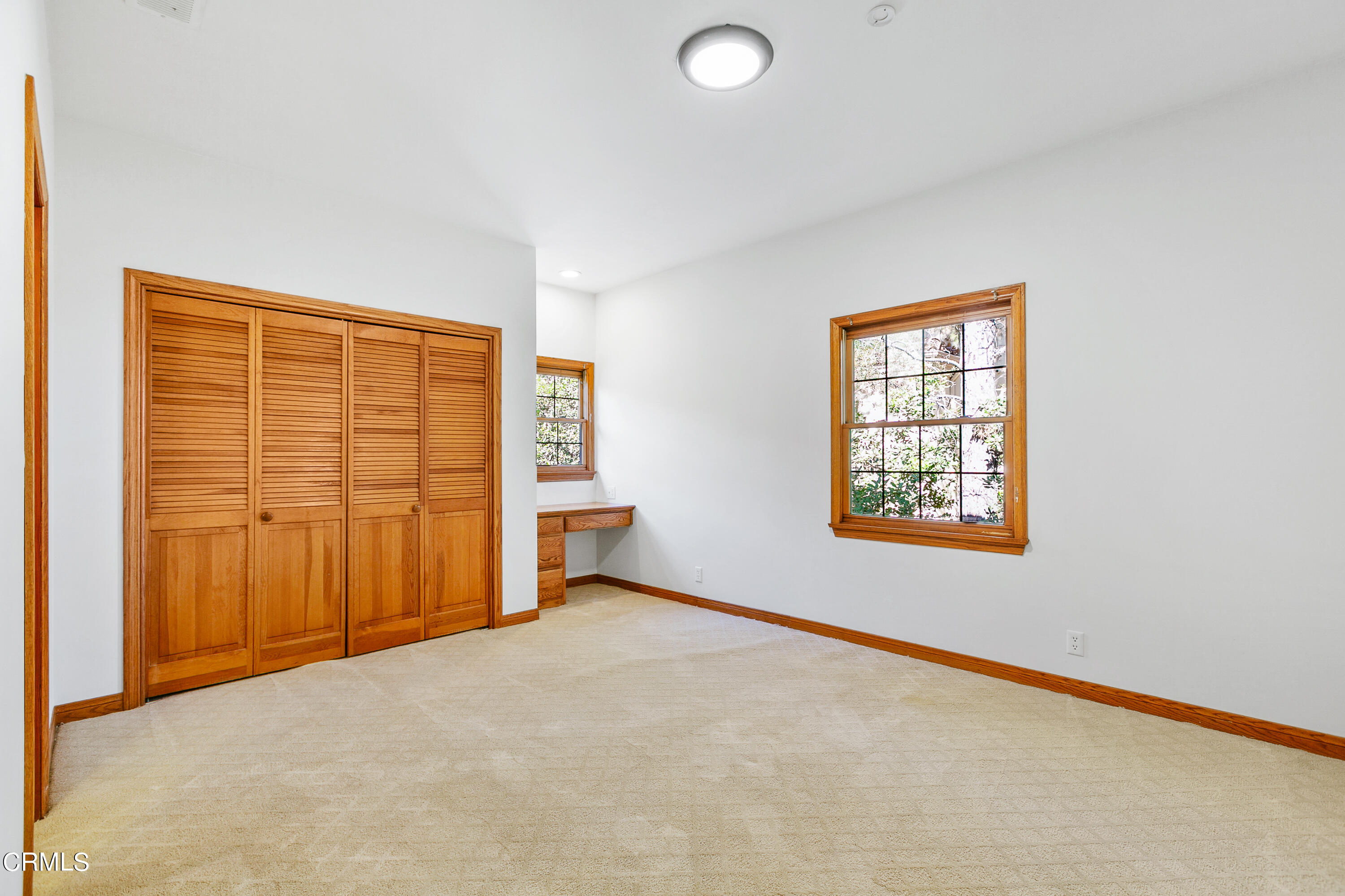 800 Greenridge Drive La Canada Flintridge, CA 91011 - Photo 45 of 58 an empty room with windows