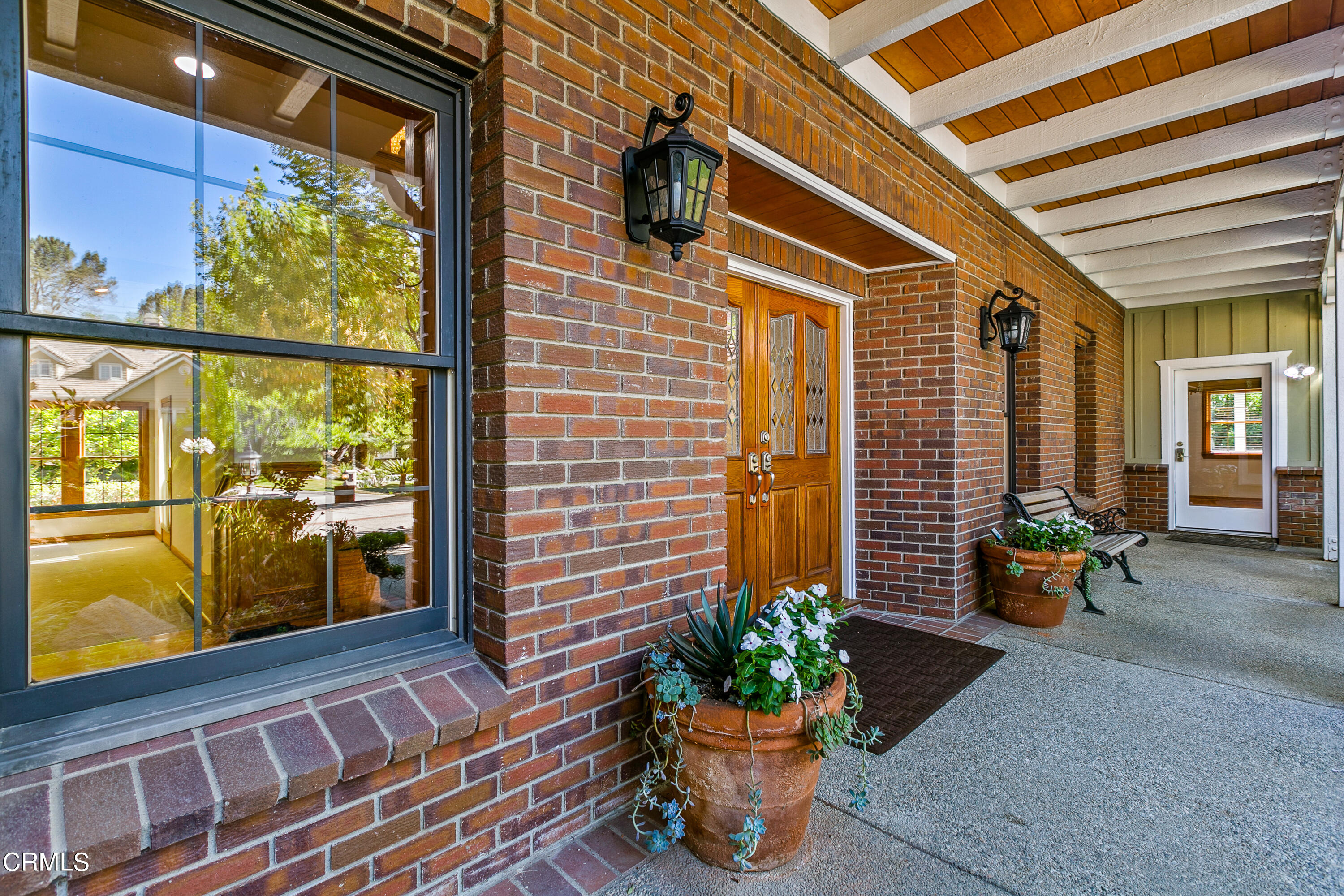 800 Greenridge Drive La Canada Flintridge, CA 91011 - Photo 6 of 58 a front view of a house with outdoor seating