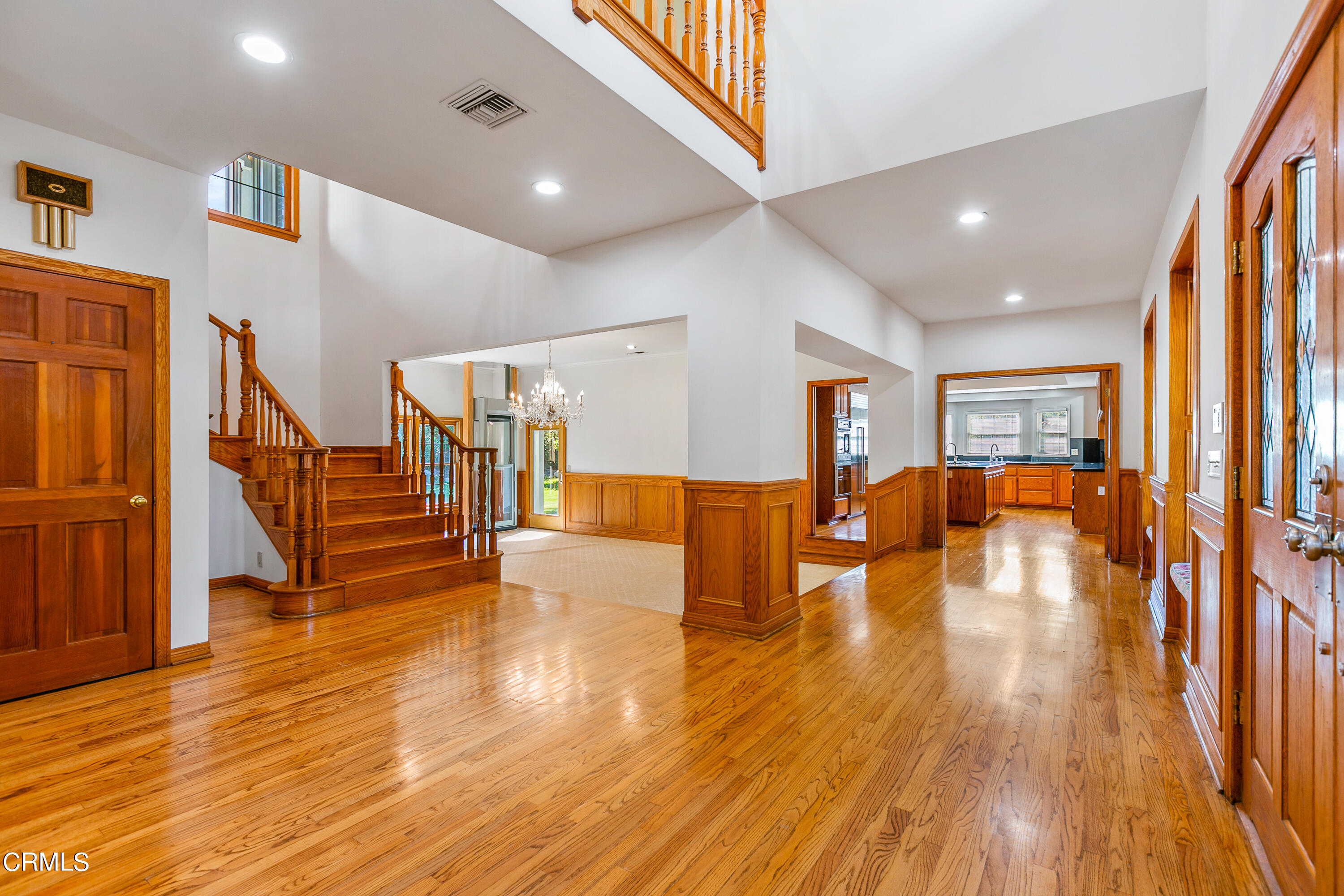 800 Greenridge Drive La Canada Flintridge, CA 91011 - Photo 8 of 58 a view of a living room with wooden floor and stairs