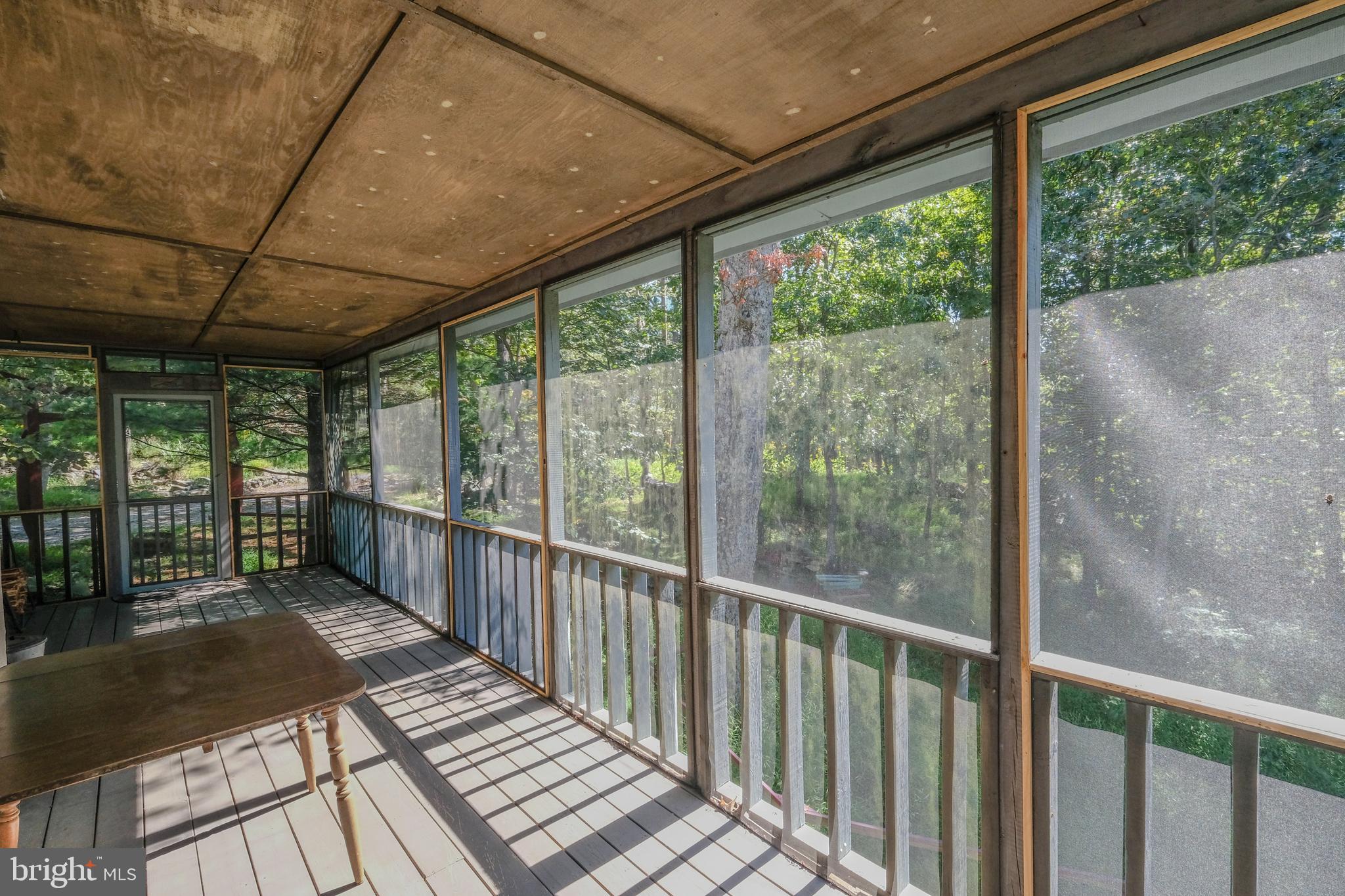 115 Mountain Top Road Front Royal, VA 22630 - Photo 41 of 78 Private screened porch