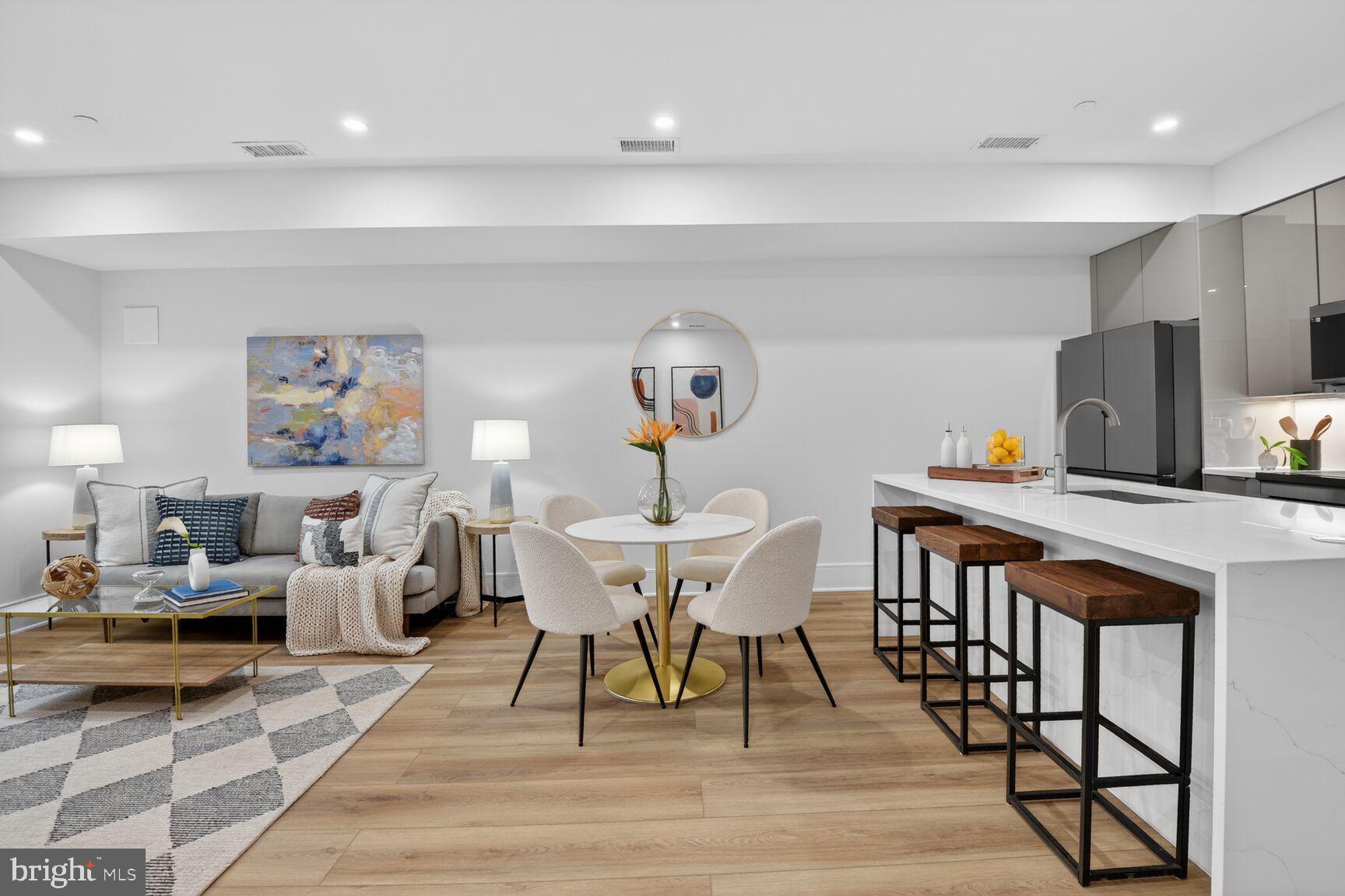 2524 41st Street Northwest, Unit 2 Washington, DC 20007 - Photo 15 of 27 a view of a dining room with furniture and wooden floor