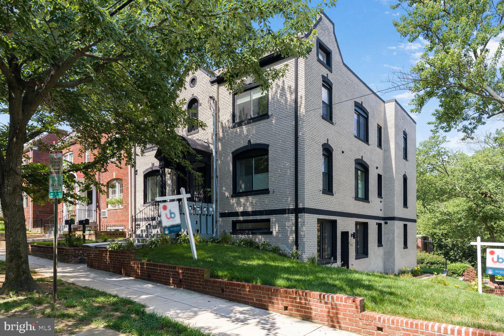 2524 41st Street Northwest, Unit 2 Washington, DC 20007 - Photo 2 of 25 front view of house with a yard
