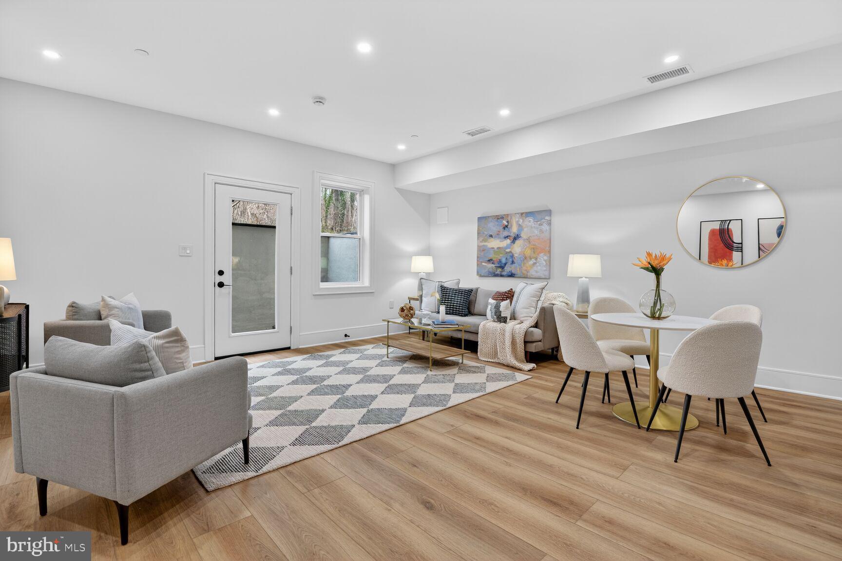 2524 41st Street Northwest, Unit 2 Washington, DC 20007 - Photo 2 of 27 a living room with furniture and a wooden floor