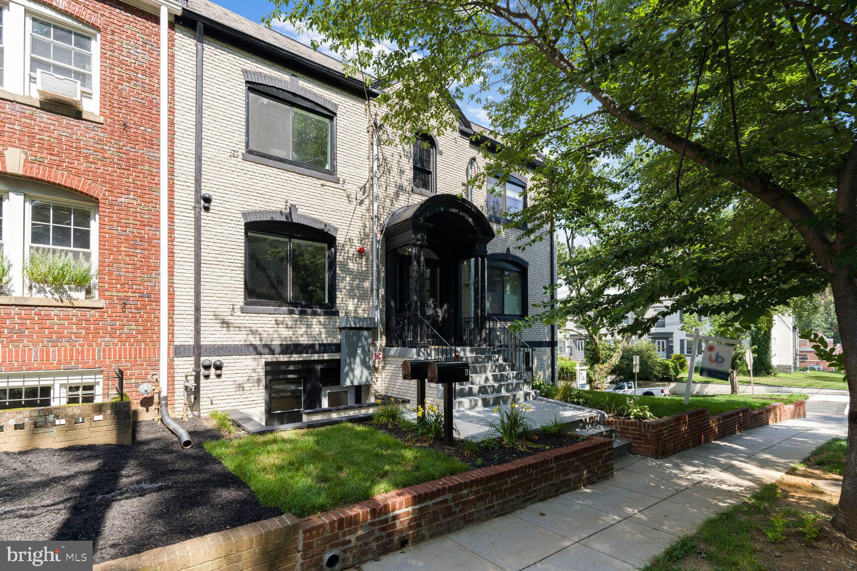 2524 41st Street Northwest, Unit 2 Washington, DC 20007 - Photo 3 of 25 a front view of a house with garden