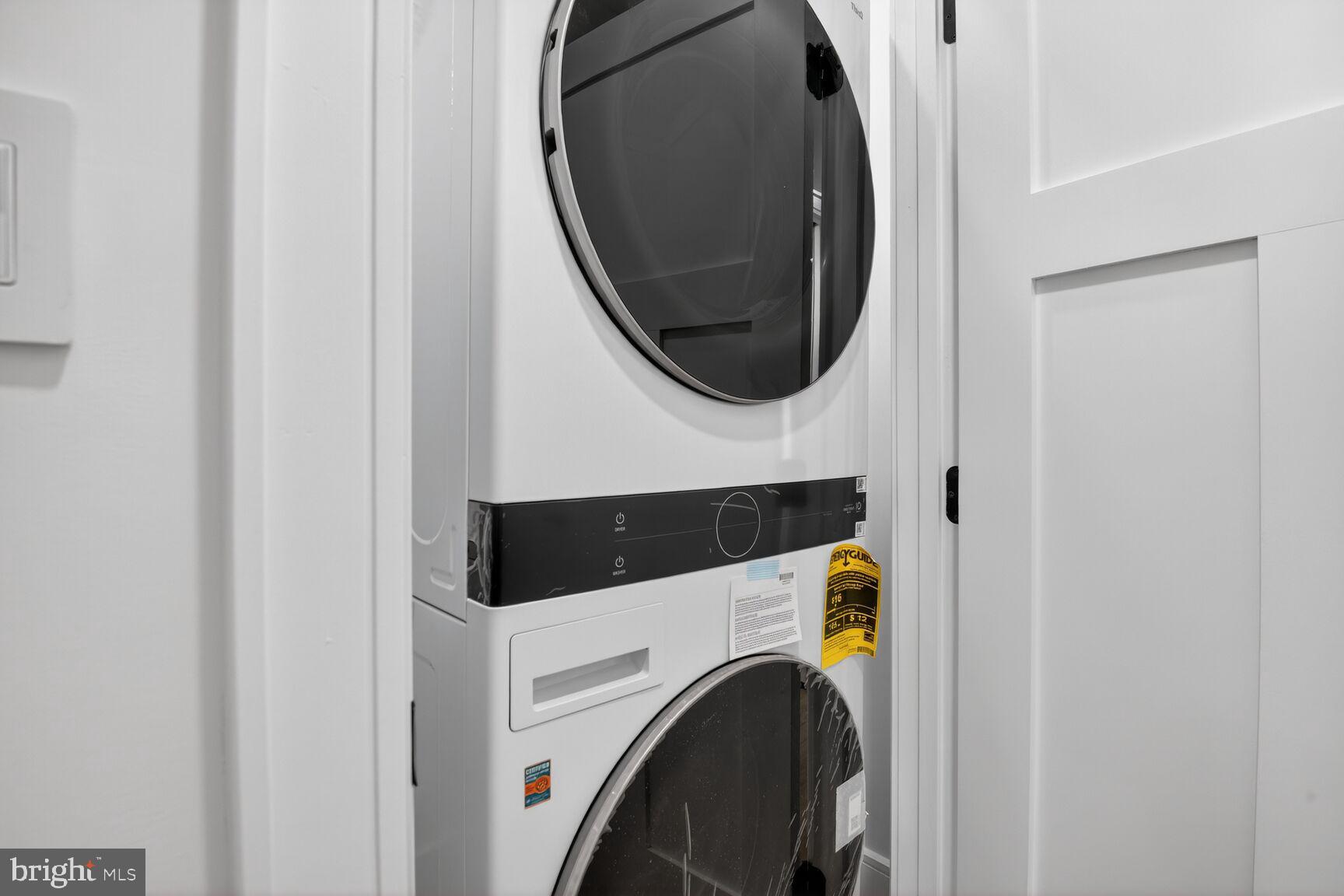 2524 41st Street Northwest, Unit 2 Washington, DC 20007 - Photo 4 of 27 a utility room with dryer and washer