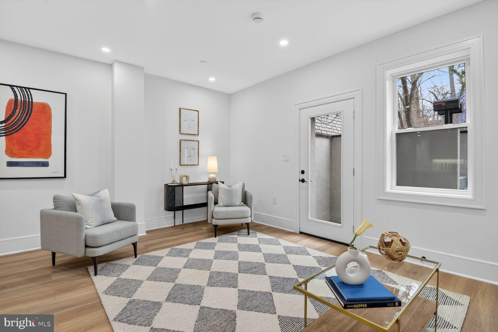 2524 41st Street Northwest, Unit 2 Washington, DC 20007 - Photo 5 of 27 a living room with furniture and a window