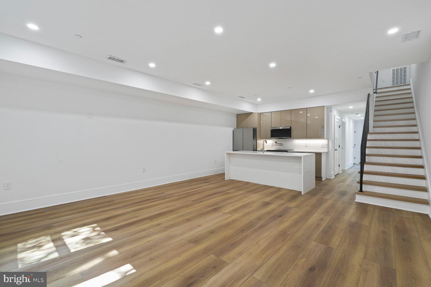 2524 41st Street Northwest, Unit 2 Washington, DC 20007 - Photo 5 of 25 a view of kitchen with wooden floor