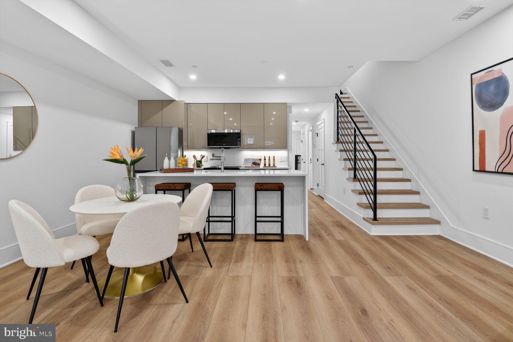 2524 41st Street Northwest, Unit 2 Washington, DC 20007 - Photo 6 of 27 a view of a dining room with furniture and wooden floor