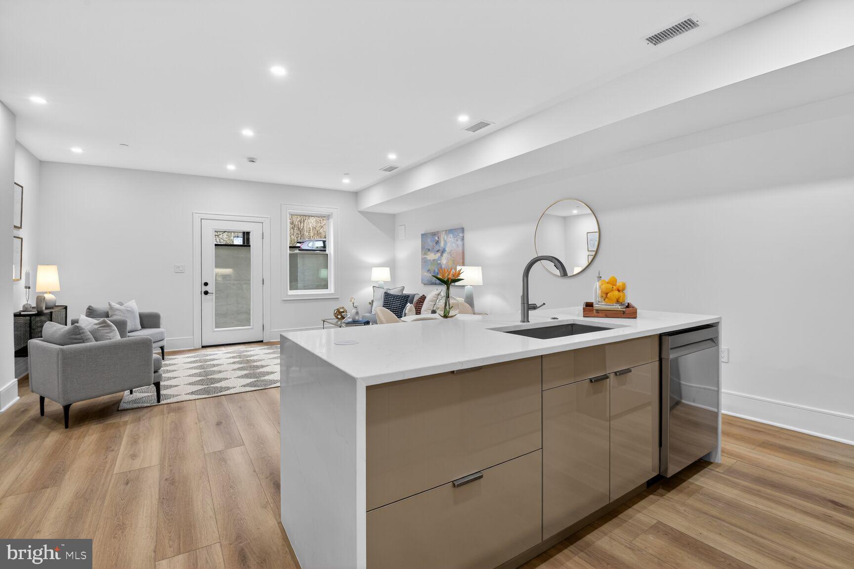 2524 41st Street Northwest, Unit 2 Washington, DC 20007 - Photo 8 of 27 a kitchen with sink and window