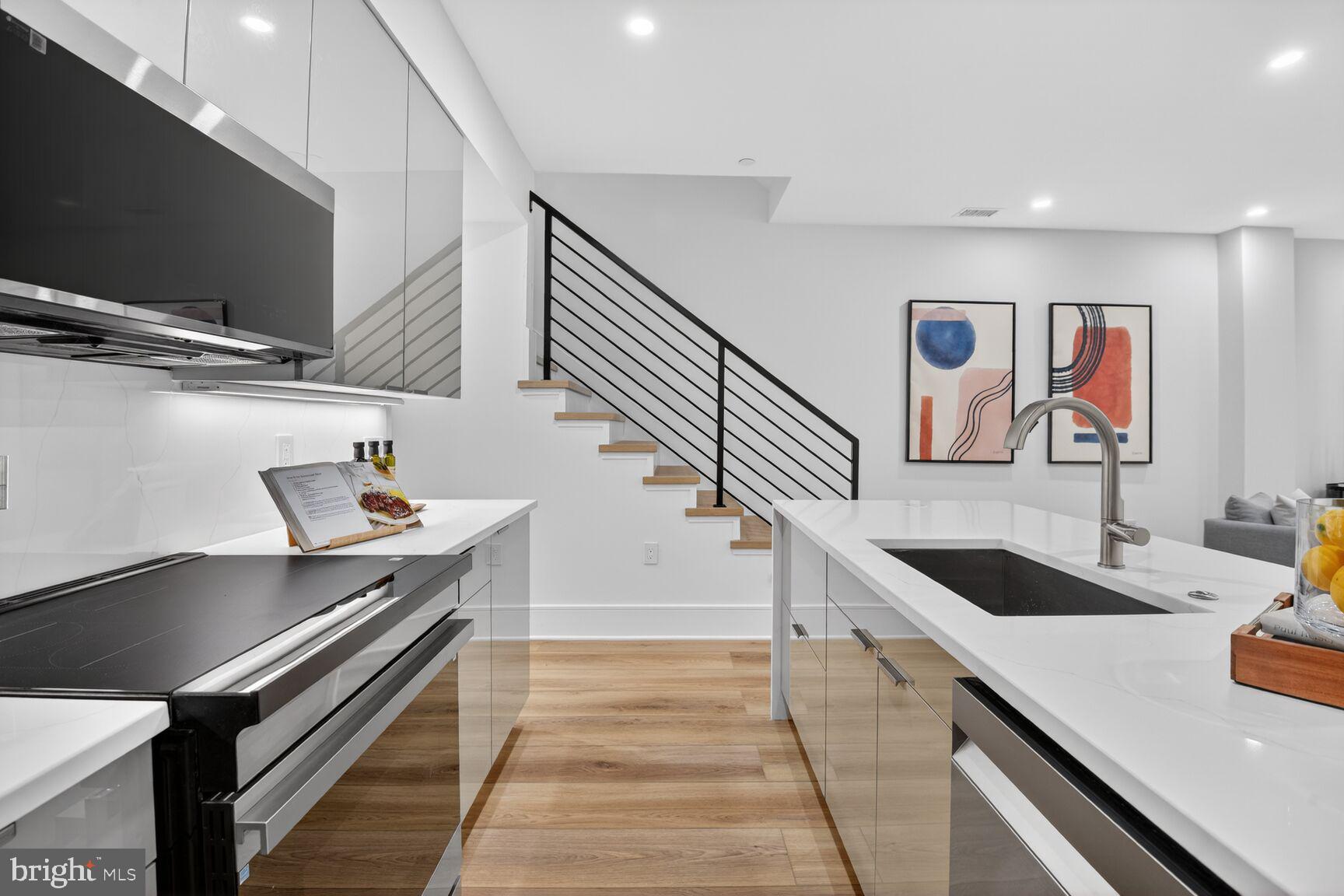 2524 41st Street Northwest, Unit 2 Washington, DC 20007 - Photo 9 of 27 a kitchen with sink and stove