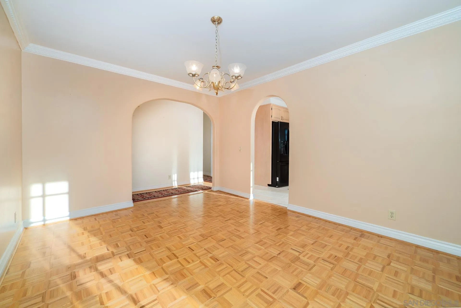 2908 Lakemont Drive Fallbrook, CA 92028 - Photo 18 of 70 a view of an empty room with chandelier and a window