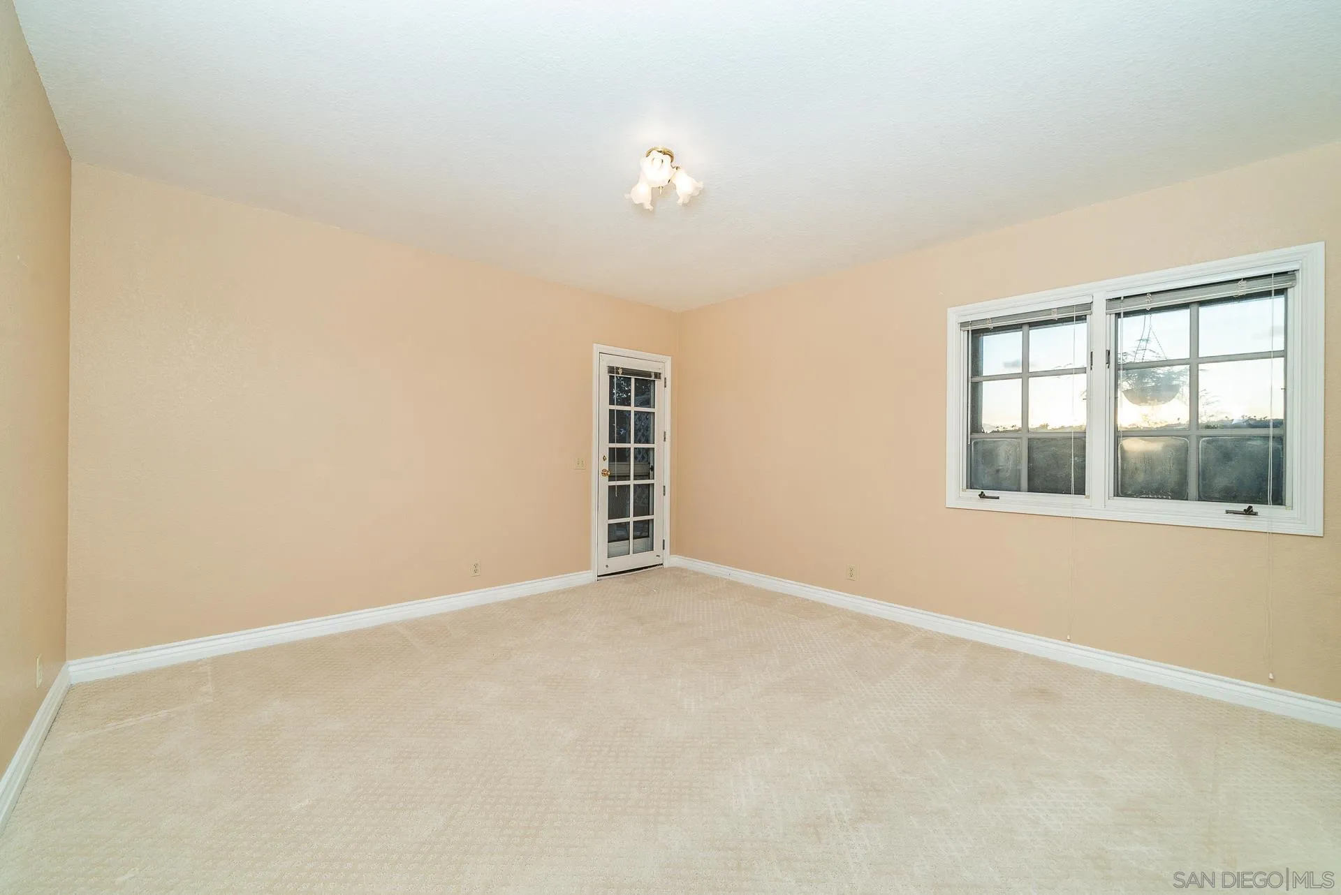 2908 Lakemont Drive Fallbrook, CA 92028 - Photo 43 of 70 a view of an empty room with a window